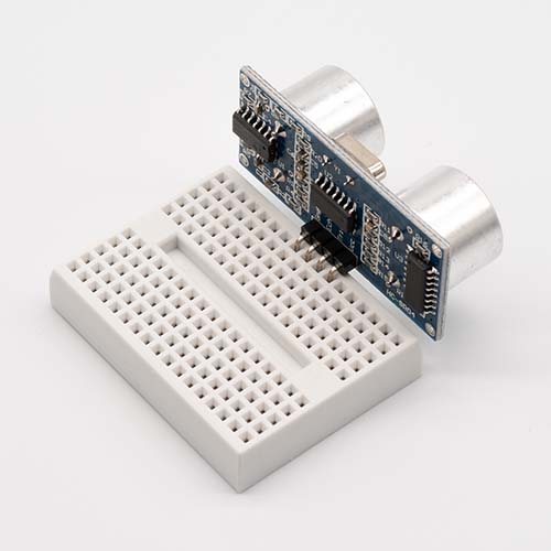 Insert Ultrasonic Range Finder into breadboard